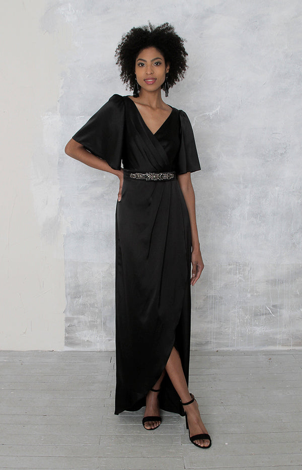 Full length shot of black wrap dress by Folkster